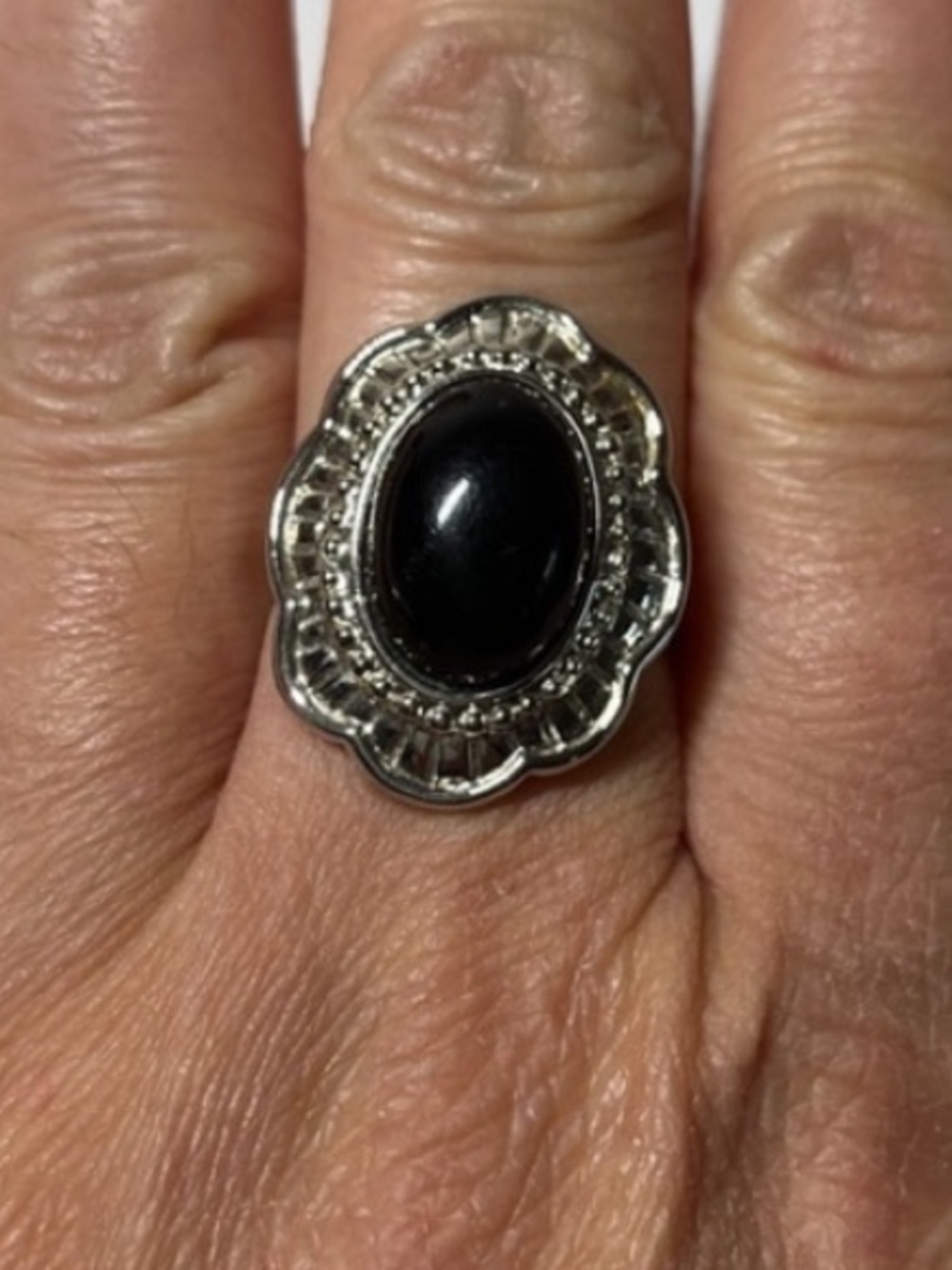 Vintage Silver Floral Frame Ring with Black Onyx Center
Size 8